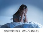 Anxiety disorder on insomnia woman concept, sleepless Woman open eye awakening on the bed at night time can