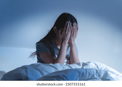 Anxiety disorder on insomnia woman concept, sleepless Woman open eye awakening on the bed at night time can't sleep from symptom of depression diseased. - Powered by Shutterstock