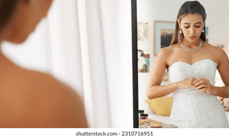 Anxiety, stress and bride thinking in mirror feeling scared, mistake or fear for marriage commitment. Nervous, mental health and worry with woman breathing to relax in wedding dress before event - Powered by Shutterstock