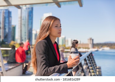 Anxiety And Stress Coping From Returning To Work Or Office After Coronavirus Pandemic. Asian Business Woman Pensive Looking Sad In City Outdoors. Mental Health