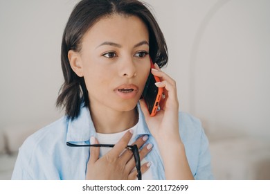 Anxious Businesswoman Has Phone Call. Young European Woman Is A Specialist Working At Home Office. Remote Work On Quarantine. Online Discussion At Workplace. Communication, Problem Solving.