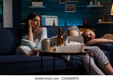 Anxious Sad Girlfriend And Boyfriend Suffering In Living Room, Having Suicidal Thoughts And Dealing With Chronic Depression. Depressed Frustrated Couple Having Anxiety And Negativity Behavior.