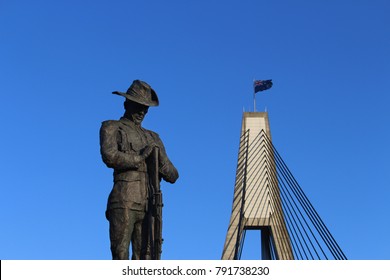 Anzac Day. Bronze Statue Of An Australian World War One Digger. The Statue Of The New Zealand Soldier. Blue Sky And The Anzac Bridge In The Background. Remembrance Day. Sydney