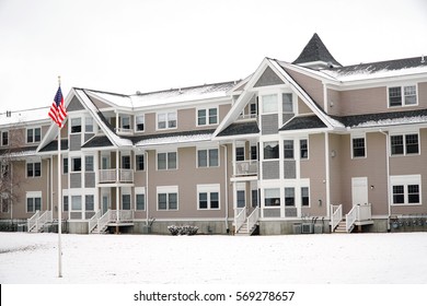 Apartment Building In Community After Snow In Winter