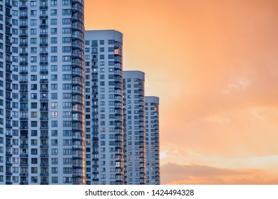 Apartment building. Image of side view of big building with appartements at dusk. New apartments. Residential building. Modern apartment condominium building