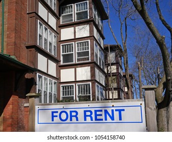 Apartment Building With For Rent Sign