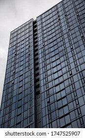 Apartment condo complex exterior blue skyscraper. Captured on May 12, 2020 in Seattle, Washington.  - Shutterstock ID 1747525907