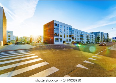 Apartment EU House Residential Building Complex Real Estate Concept. And Road With Street Car Parking. During The Sunset. Mixed Media.