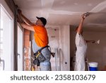 Apartment renovation. Home renovation workers crew. Builders apartment improvement or restoration works.