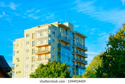 Apartment In Residential Building Exterior. Housing Structure At Blue Modern House Of Europe. Rental Home In City District On Summer. Architecture For Business Property Investment, Vilnius, Lithuania.