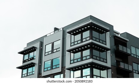 Apartments building against a cloudy sky