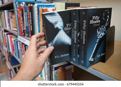 APELDOORN, THE NETHERLANDS - JULY 4, 2017: The Fifty Shades trilogy in a Dutch second hand store. Bestselling Fifty Shades trilogy is a series of erotic novels by the English author E. L. James. 
