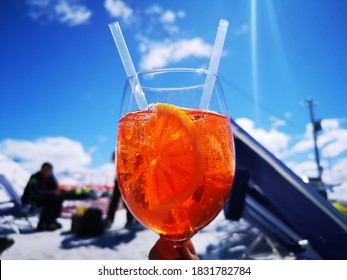 Aperol Orange Drink In Winter Mountains