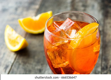 Aperol Spritz Cocktail In Glass On Wooden Table
