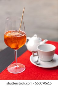 Aperol Spritz Cocktail With Olive And Lemon Piece As It Can Be Served In Venice, Italy.