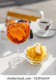 Aperol Spritz Cocktail With Olive And Orange Piece As It Can Be Served In Venice, Italy.