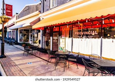 Apex, North Carolina USA-03 04 2021: Outdoor Tables For A Restaurant In Downtown Apex.