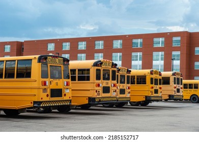 Apex,NC USA 072822 Public School Buses Sit Ready For The New School Year In The Parking Lot Of Apex High School.