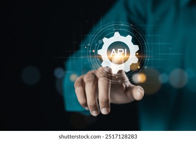 API Application Programming Interface concept, Businessman touching  API software development tool on virtual screen. - Powered by Shutterstock