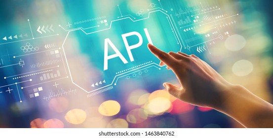 API Concept With Hand Pressing A Button On A Technology Screen