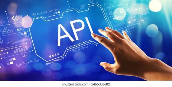 API Concept With Hand Pressing A Button On A Technology Screen