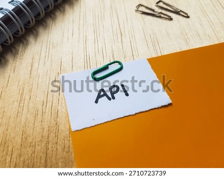 Api writting on table background. 