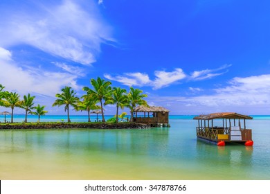 Apia, Samoa. Hut And Boat By The Beach.