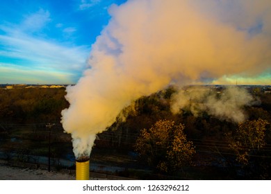 Apocalypse Colors In The Sky As Time Is Running Out On Climate Change Smoke Stack Releasing Toxins And Fossil Fuel Pollution In Texas A Large Polluter