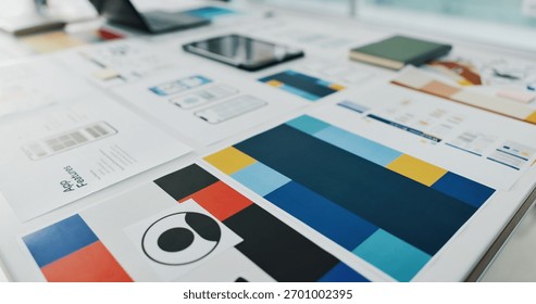 App development, wireframe documents and design illustration for site features, UI and template. Paperwork, blueprint and smartphone layout in office for mobile software, UX mapping and graphic model