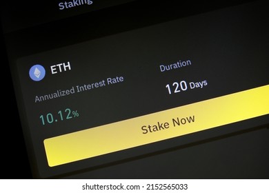 App with function to stake Ethereum for fixed interest rate and period. App allowing cryptocurrency hodlers to stake cryptos to earn rewards or interests on their holdings. Phone screen closeup view. - Shutterstock ID 2152565033