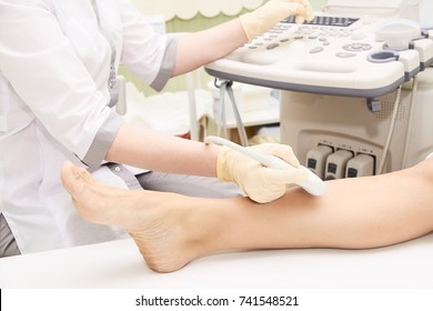 Apparatus ultrasound examination. Patients foot. Doctors work. Medical research.