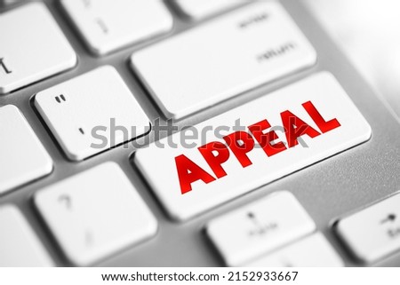 Appeal - process in which cases are reviewed by a higher authority, text concept button on keyboard