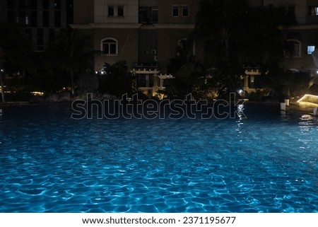 Appearance of the apartment pool at night