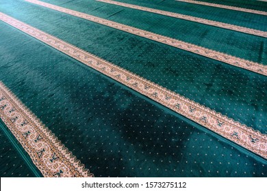 The Appearance Green Prayer Mat On The Mosque.