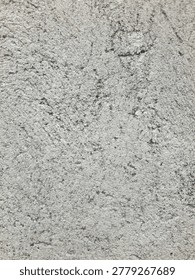 The appearance of the wall surface is uneven and irregular