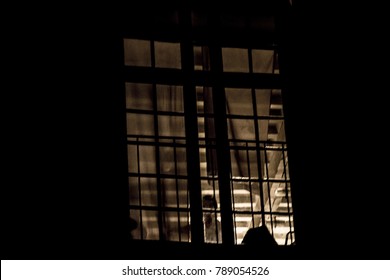 appearances behind the windows in the dark