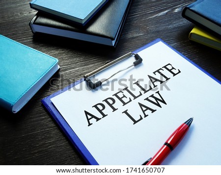 Appellate law, pen and notepads on the desk. Stock photo © 