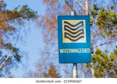 Appelscha, The Netherlands - April 18, 2021: Blue sign with text Waterwingebied or Water catching area Aekingerzand in nature park Drents Friese Wold near Appelscha in Drenthe The Netherlands