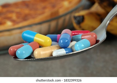 Appetite Suppressant Concept With Drugs In A Spoon Close-up