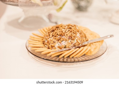 An Appetizer Of A Cheese Spread Served At A Party