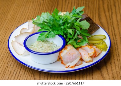 Appetizer With Lard, Bread And Cucumbers