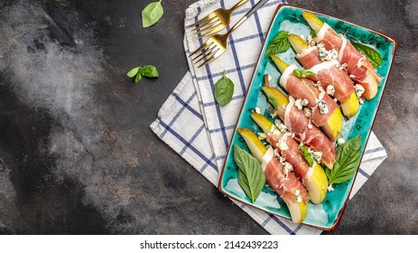 Appetizer With Pear, Blue Cheese And Prosciutto Ham On A Dark Background, Healthy Fats, Clean Eating For Weight Loss, Long Banner Format. Top View.