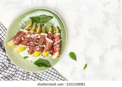 Appetizer With Pear, Blue Cheese And Prosciutto Ham On A Dark Background, Healthy Fats, Clean Eating For Weight Loss, Long Banner Format. Top View.