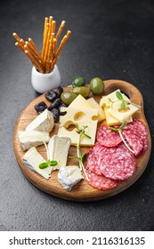 Appetizer Plate Cheese, Sausage, Olives, Bread Sticks Ready To Eat Fresh Portion Dietary Healthy Meal Food Diet Still Life Snack On The Table Copy Space Food Background Rustic Top View