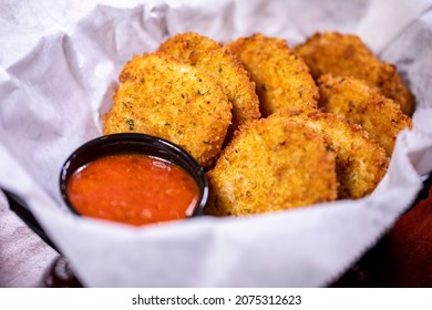 Appetizer Shareable Starter Basket Bowl Breaded Deep Fried Fresh Mozzarella Cheese Rounds Sticks Chips Red Marinara Pomodoro Dipping Sauce Deli Paper Rustic Wooden Dining Table