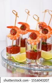 Appetizer Of Shish Kebab With Shrimps And Chorizo Sausages With Barbecue Sauce In A Glass