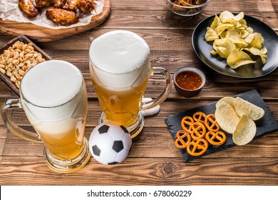 Appetizers And Beer On The Table For The Football Party And Watch The Football Match.