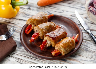 Appetizers with chiken roll and vegetables