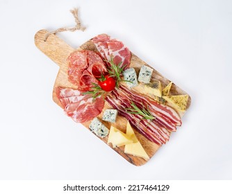 Appetizers table with different antipasti, charcuterie, snacks and cheese. Buffet party. Wooden cutting board isolated on white background, top view	 - Shutterstock ID 2217464129
