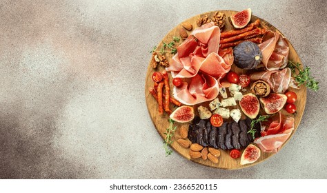 Appetizers table with different antipasti on a light background. Long banner format. top view. - Powered by Shutterstock